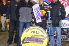 eagle-04-21-12-ascs-tony-stewart-with-aric-almirola-and-crew